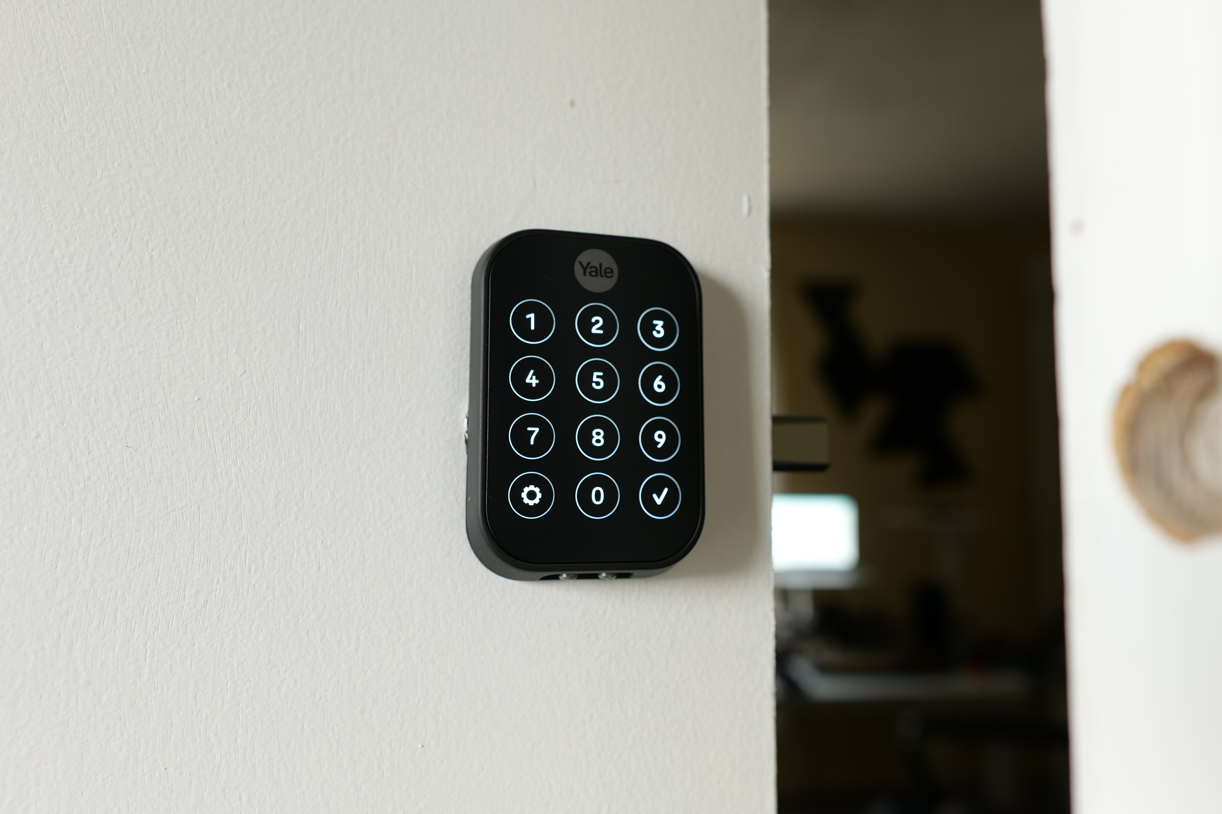 A photo of the Yale Assure Lock 2 installed on a door