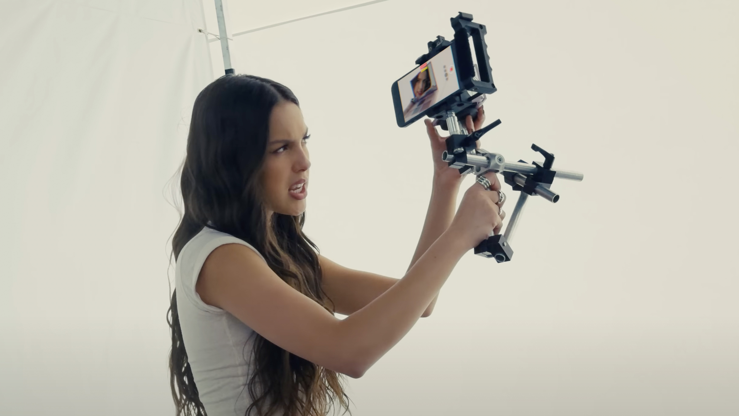 The iPhone 15 Pro being used in an Olivia Rodrigo music video