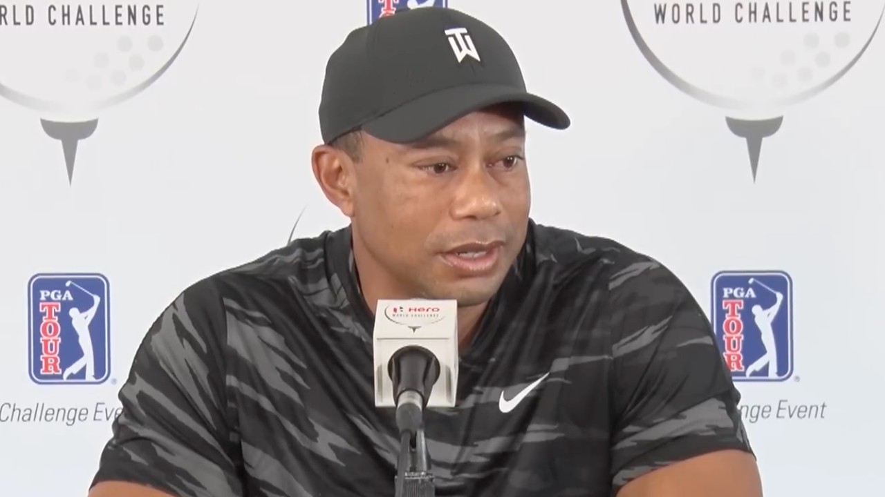 Tiger Woods speaks at a press conference.