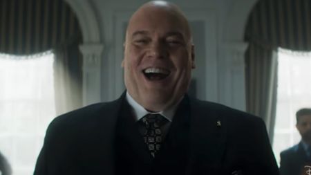 Vincent D'Onofrio with a big smile, wearing a suit as Kingpin in Daredevil: Born Again Season 2