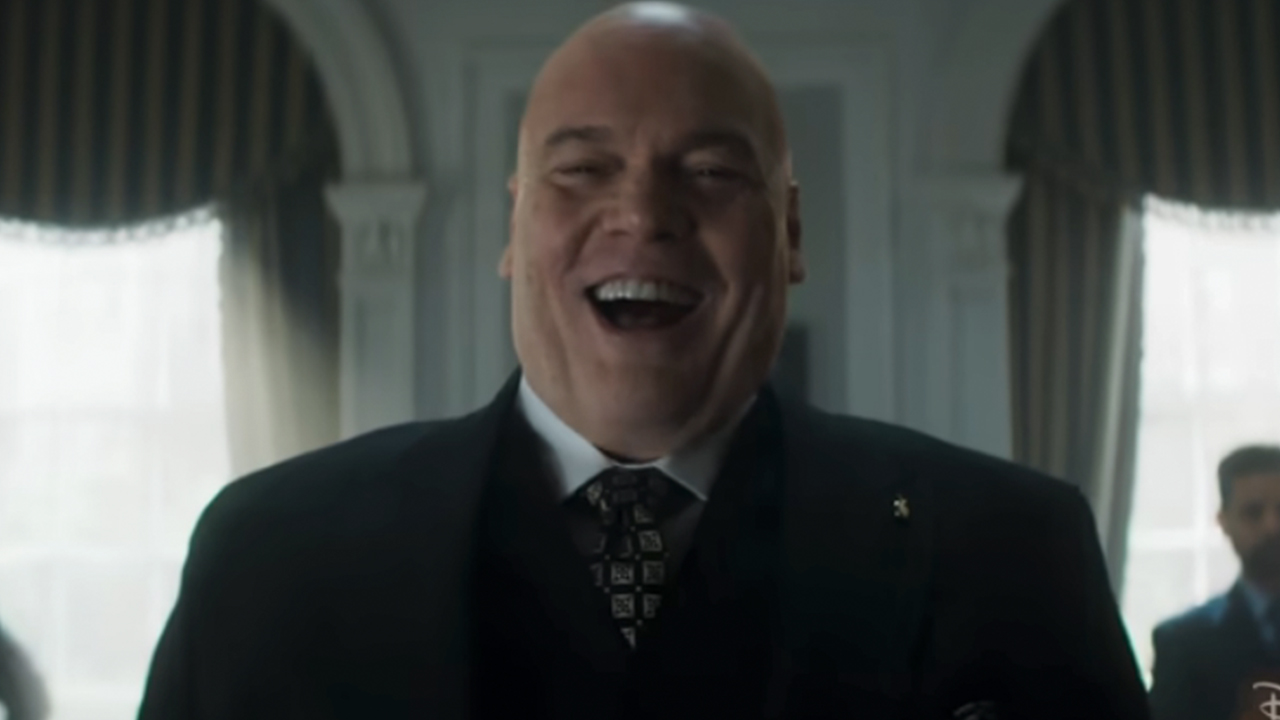 Vincent D'Onofrio with a big smile, wearing a suit as Kingpin in Daredevil: Born Again Season 2