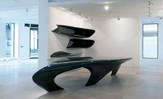 Also on display are shelving units, tables and benches from the ‘Dune Formations’ series by Zaha Hadid