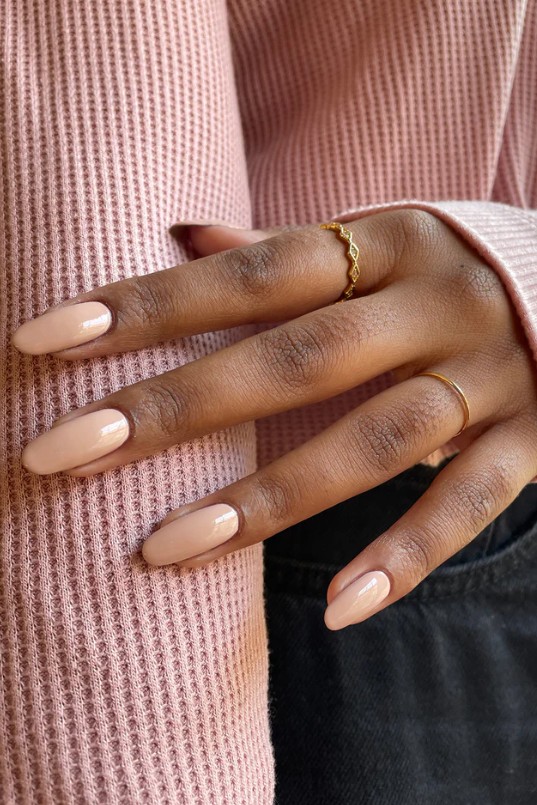 A warm nude manicure.