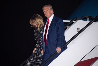 Trump deplanes from Air Force One