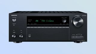 Listing image on blue background showing front panel of Onkyo TX-NR7100 AV receiver
