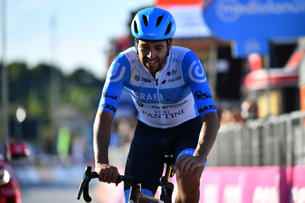 VIESTE ITALY OCTOBER 10 Arrival Alex Dowsett of The United Kingdom and Team Israel StartUp Nation Celebration during the 103rd Giro dItalia 2020 Stage Eight a 200km stage from Giovinazzo to ViesteGargano girodiitalia Giro on October 10 2020 in Vieste Italy Photo by Stuart FranklinGetty Images