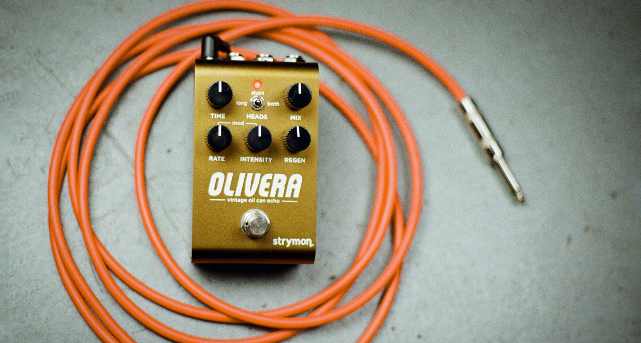 The Strymon Olivera is a five-knob stompbox in bronze-brown that offers an emulation of an oil-can delay