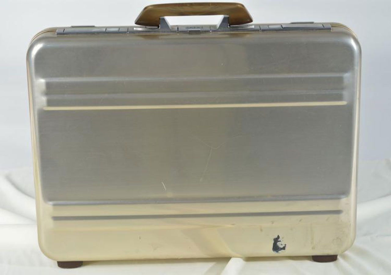 No one knows the combination of the lock, so the potential contents of the case are unknown.