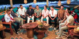 Bachelor in Paradise Season 7 men talk while Brendan Morais looks shifty.
