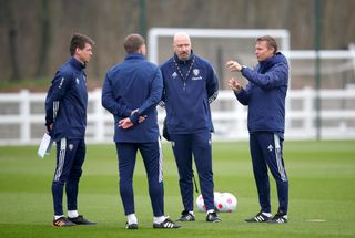 Leeds' new head coach Jesse Marsch, right, assistants Cameron Toshack (second right) and Franz Schiemer (left) during training at Thorp Arch