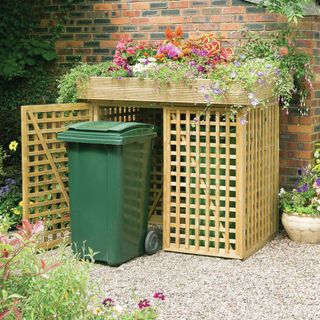 small front garden ideas: wheelie bin storage with growing roof from Cuckooland