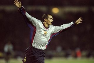 Phillip Cocu celebrates a goal for Barcelona against Arsenal in the Champions League at Wembley in October 1999.