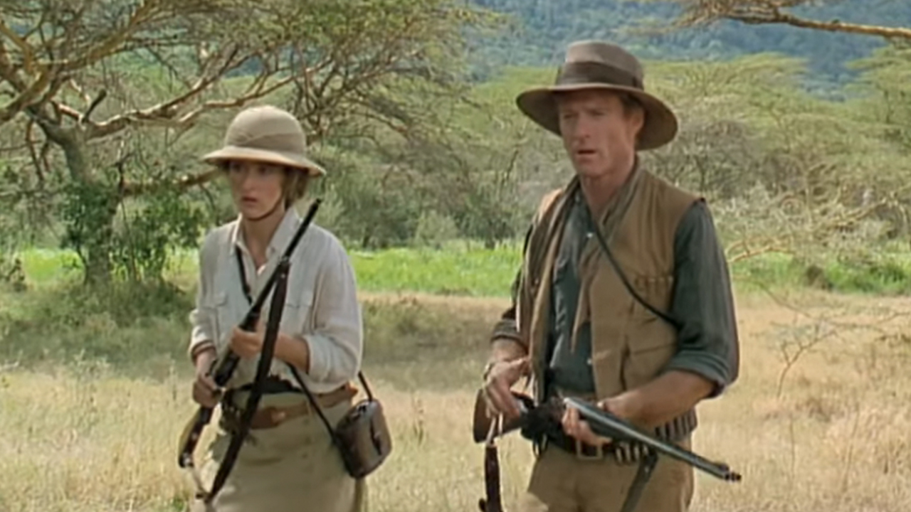 Meryl Streep and Robert Redford carrying guns, hunting in Out Of Africa