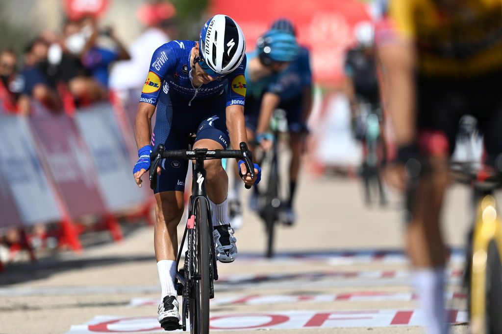 ALTO DE LA MONTAA DE CULLERA SPAIN AUGUST 19 Andrea Bagioli of Italy and Team Deceuninck QuickStep crosses the finishing line during the 76th Tour of Spain 2021 Stage 6 a 1583km stage from Requena to Alto de la Montaa de Cullera 184m lavuelta LaVuelta21 on August 19 2021 in Alto de la Montaa de Cullera Spain Photo by Stuart FranklinGetty Images
