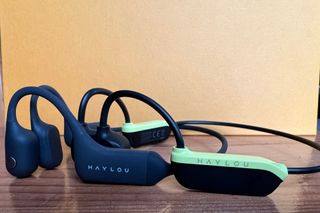The Haylou PurFree Lite headphones on the right next to the Haylou PureFree BC01 headphones on the left