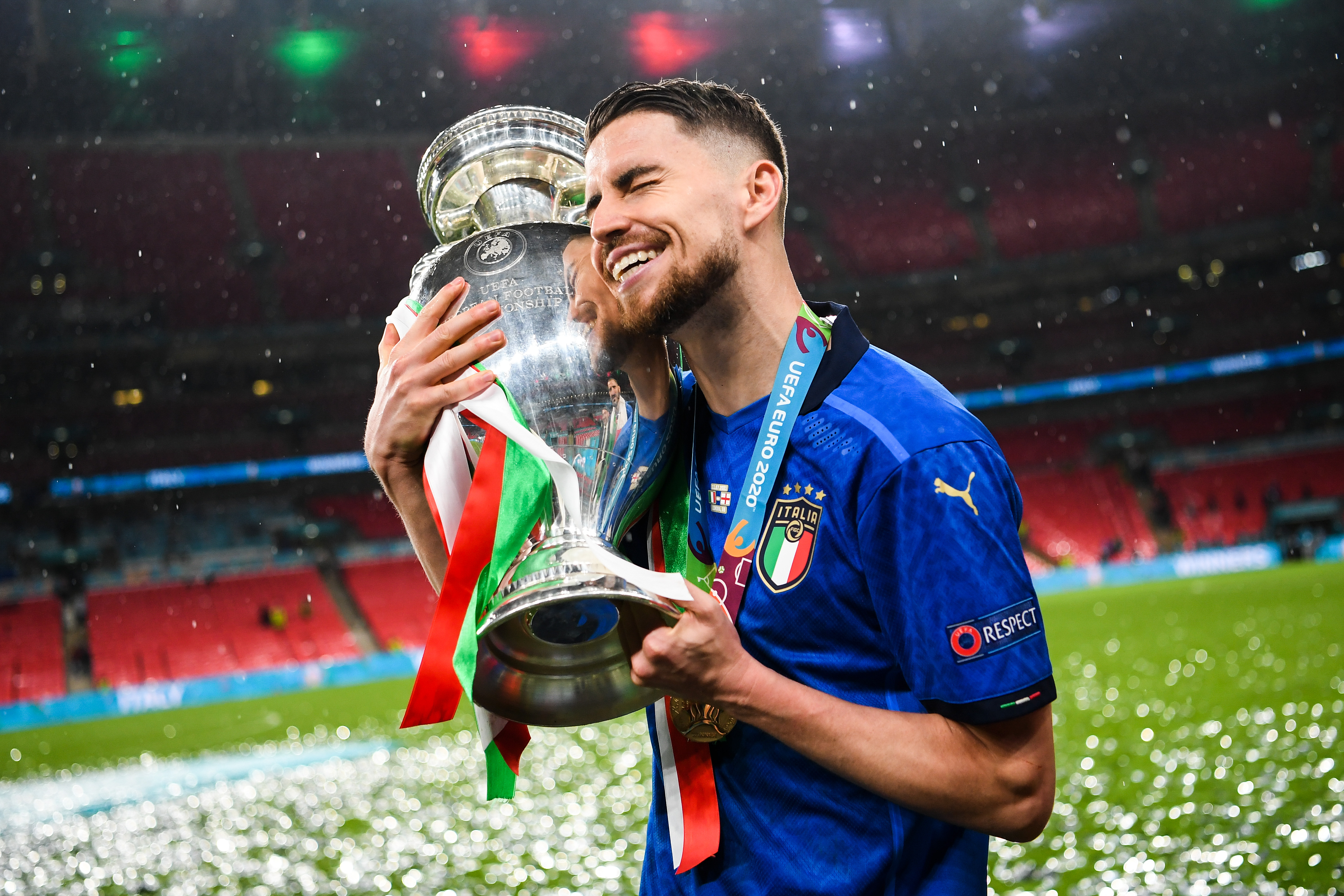 Jorginho poses with the European Championship trophy after Italy's win over England in the final of Euro 2020.