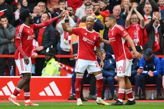 Nottingham Forest players celebrate a goal against Wolves in the Premier League in April 2024.