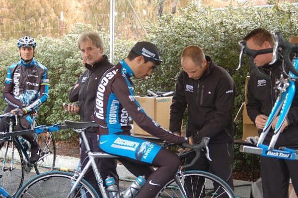 Adjustments before the ride. Riders are still getting used to their new machines.