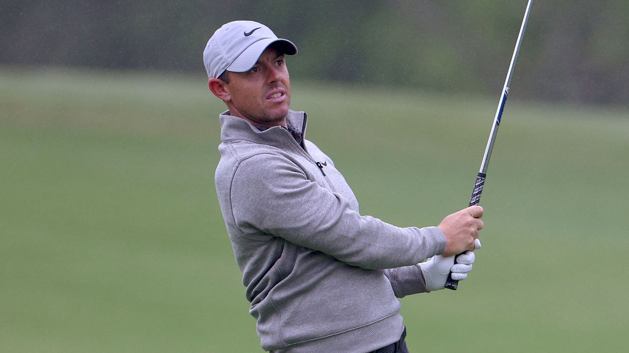 Rory McIlroy plays an iron shot