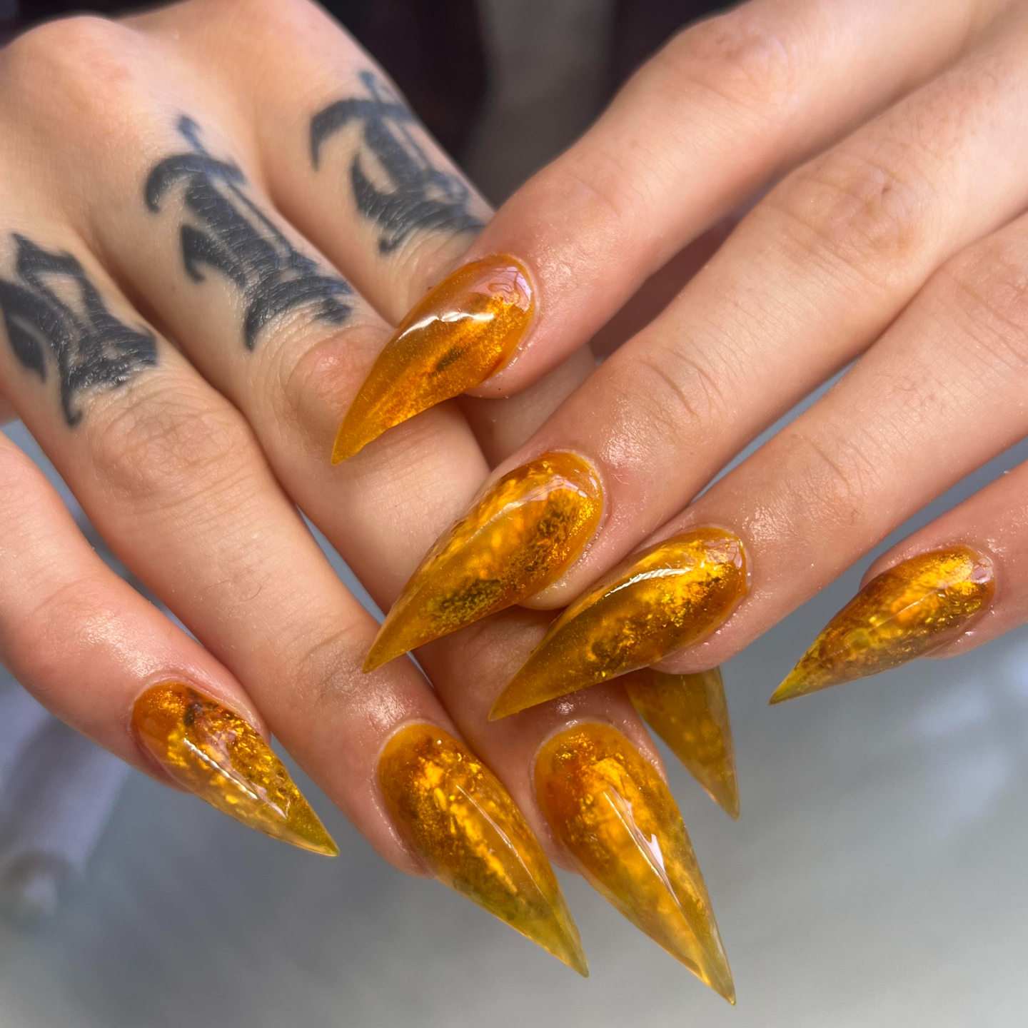 Imperial topaz crystal-inspired nails