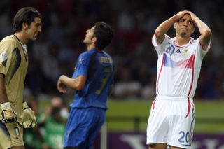 David Trezeguet holds his head after missing a penalty for France against Italy in the shootout in the 2006 World Cup final.