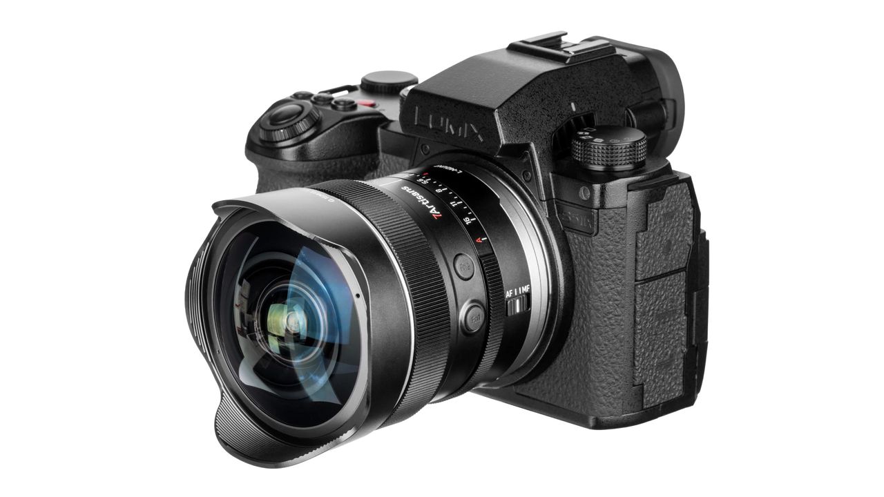 7Artisans AF 10mm f/2.5 Max mounted to a Lumix camera, against a white background