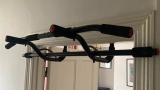 Adidas Training pull-up bar mounted in doorway