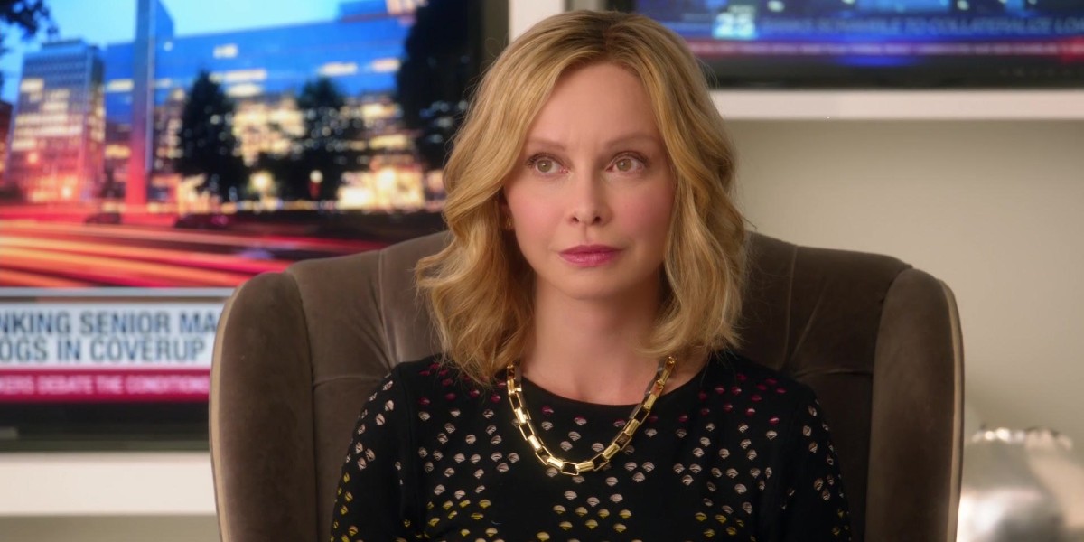 Cat Grant (Calista Flockhart) looks on in Supergirl