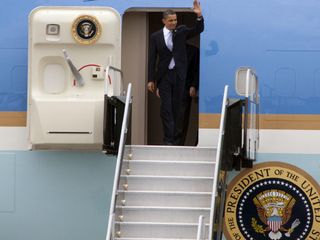 President Barack Obama arrives at the Shuttle Landing Facility at NASA's Kennedy Space Center in Florida aboard Air Force One, prior to addressing a space conference.
