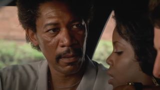 Morgan Freeman glares angrily in a crowded car in Street Smart.