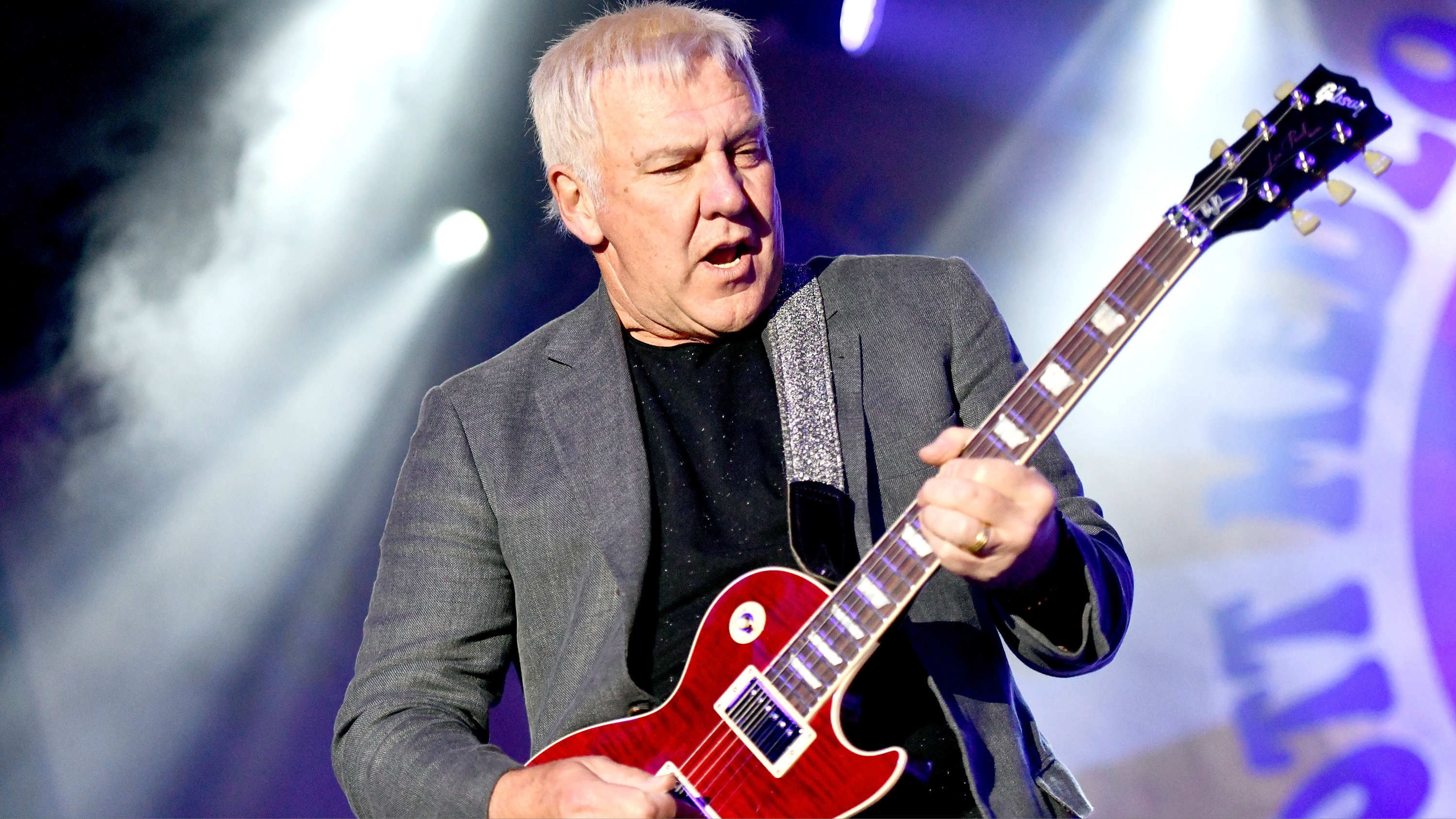Alex Lifeson onstage at the Medlock-Krieger All-Star Concert, 2018