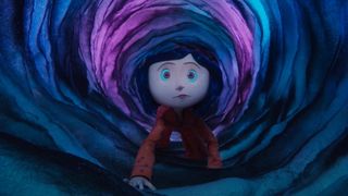 Coraline crawls through a tunnel