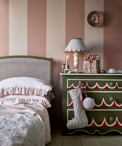 Christmas bedroom decor ideas with pink painted stripes on wall