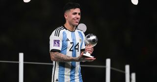 Enzo Fernandez of Argentina poses for a photo with the FIFA Young Player award during the FIFA World Cup Qatar 2022 Final match between Argentina and France at Lusail Stadium on December 18, 2022 in Lusail City, Qatar.