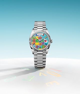 Rolex watch with jigsaw puzzle colourful face