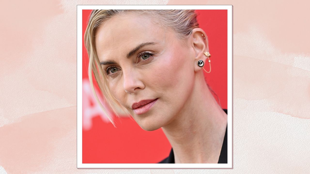 Charlize Theron is seen wearing soft pink blush and with her hair in a slicked-back updo whilst attending the Charlize Theron Africa Outreach Project 2024 Block Party at Universal Studios Backlot on July 13, 2024 in Universal City, California/ in a pink watercolour paint-style template