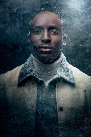 A digitally retouched image of a man covered in ice