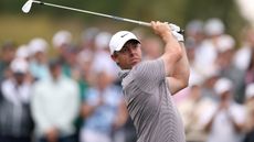 Rory McIlroy hits an iron shot