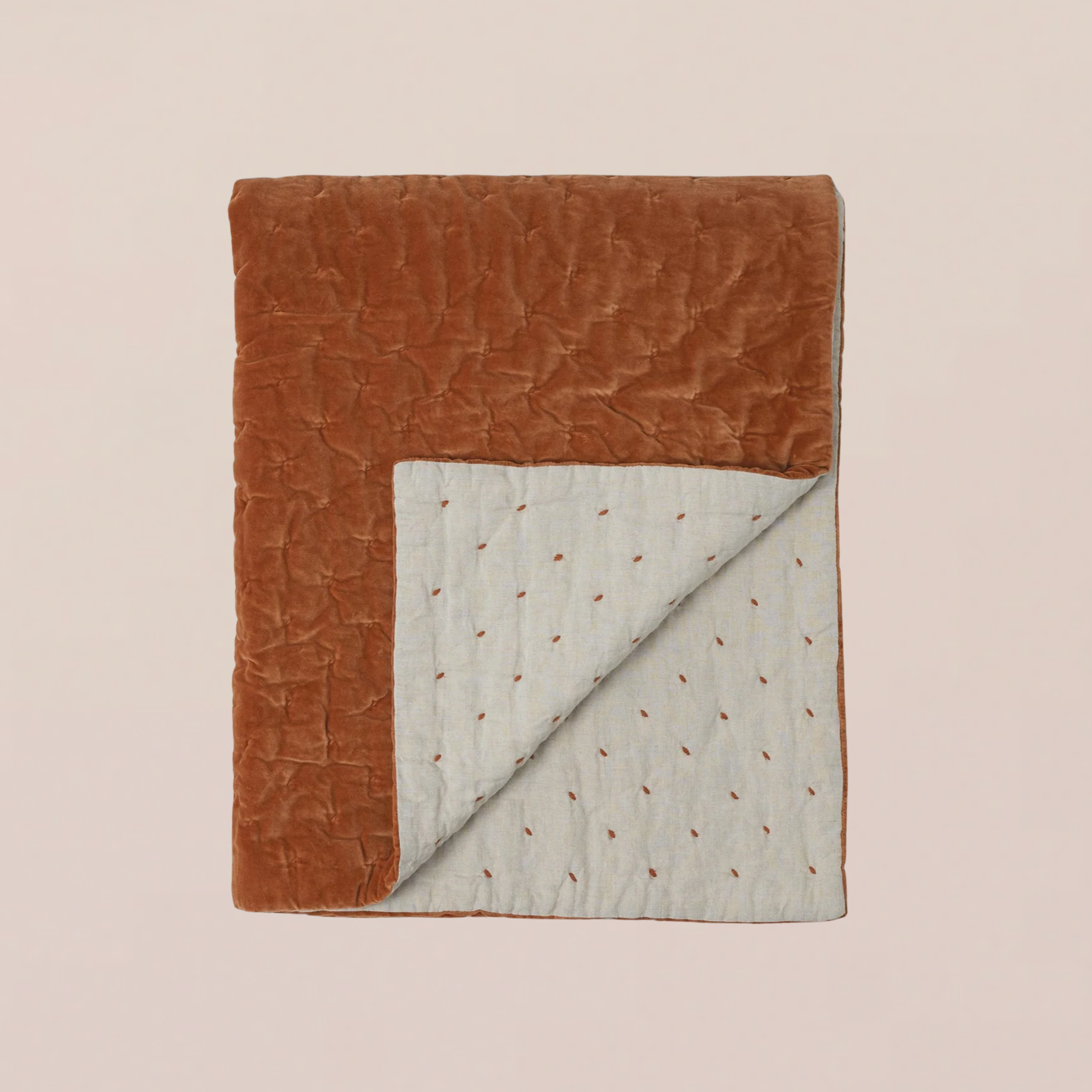 Quilted velvet orange throw