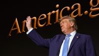 WASHINGTON, DC - SEPTEMBER 29: U.S. President Donald Trump waves after speaking during the America.gov launch event at Andrew W. Mellon Auditorium on September 29, 2026 in Washington, DC. The website features an artificial intelligence tool to help Americans interact with the federal government. The event was attended by tech leaders Elon Musk, Nvidia CEO Jensen Huang and Blue Origin CEO Dave Limp, along with U.S. Vice President JD Vance and U.S. Secretary of State Marco Rubio. (Photo by Kevin Dietsch/Getty Images)