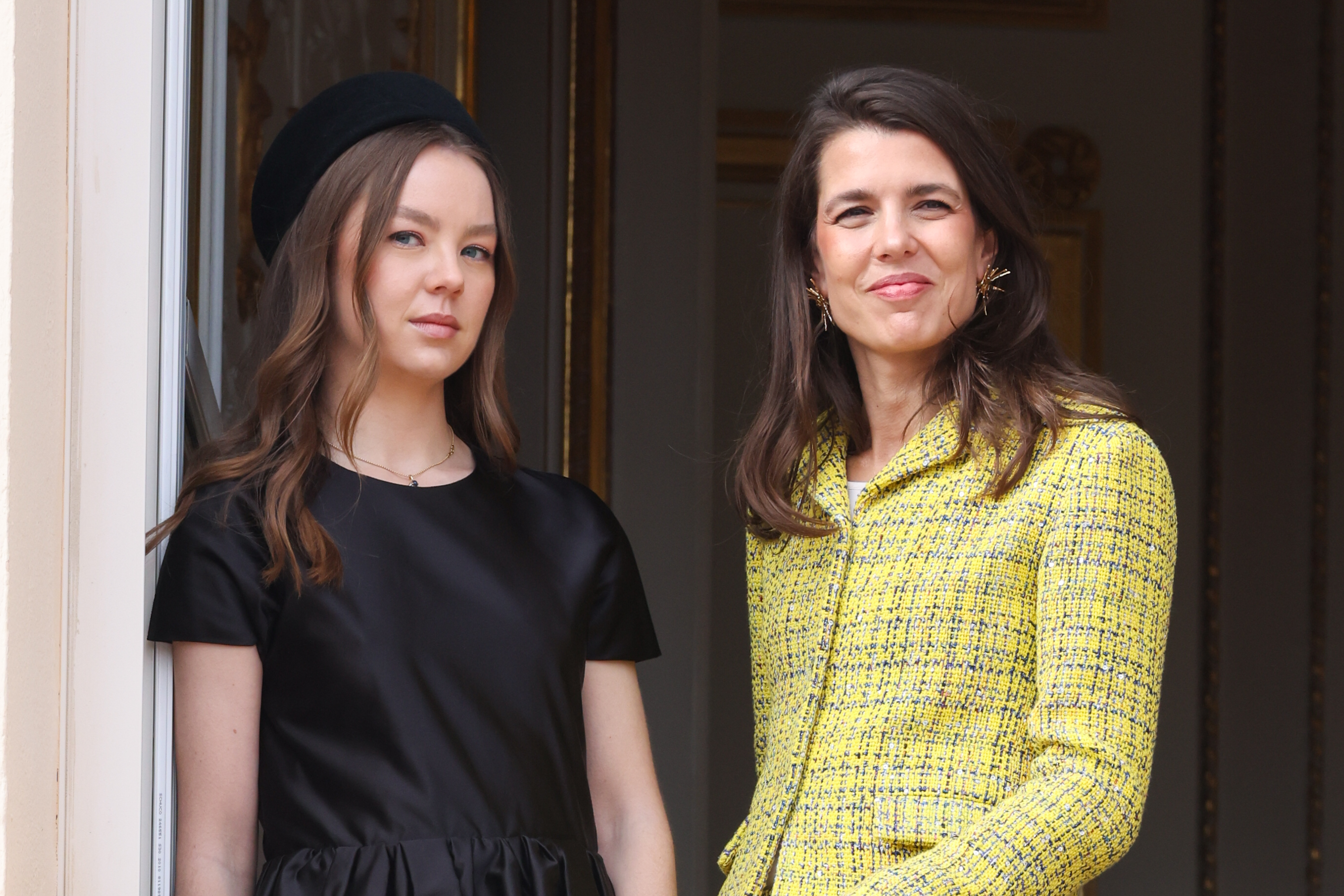 Charlotte Casiraghi in a yellow suit and Princess Alexandra of Hanover in a black dress