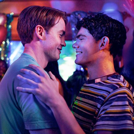 kit connor and joe locke embrace at a party on a dancefloor in a first look image at the heartstopper finale movie heartstopper forever