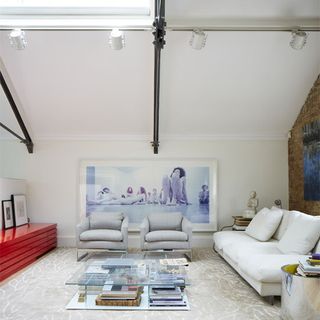living room with white wall and sofa