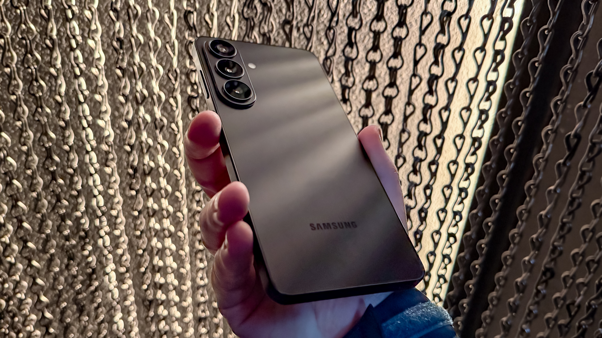 Samsung Galaxy S26 Plus held in the hand.