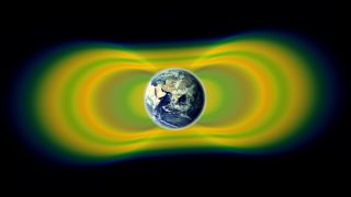 Two giant swaths of radiation, known as the Van Allen Belts, surrounding Earth were discovered in 1958. In 2012, observations from the Van Allen Probes showed that a third belt can sometimes appear. The radiation is shown here in yellow, with green representing the spaces between the belts.