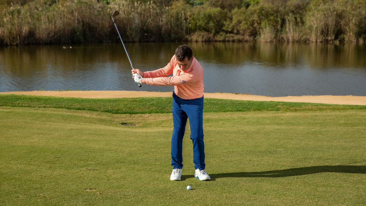 PGA pro Dan Grieve hitting a pitch shot at Lumine Golf Resort 