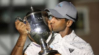 Aaron Rai with the Wyndham Championship trophy