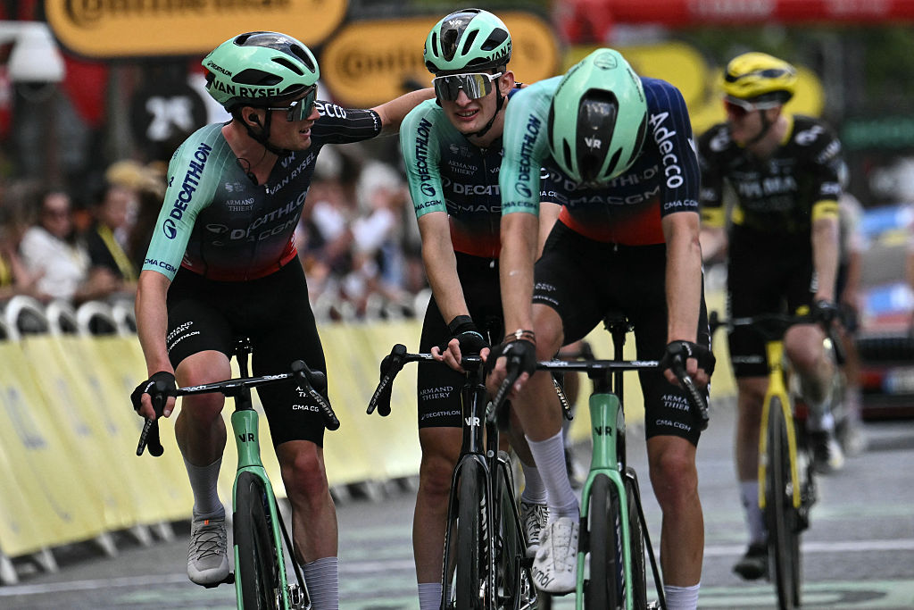 Decathlon CMA CGM Team's French rider Paul Seixas (C) cycles to the finish line of the 21st stage of the 113th edition of the Tour de France cycling race, 88,7 km starting and finishing in Paris, on July 26, 2026. (Photo by Jeff PACHOUD / AFP)