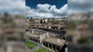 This panorama shows the ancient town of Herculaneum. In A.D. 79, Mt. Vesuvius erupted, burying this town, Pompeii and other nearby settlements.