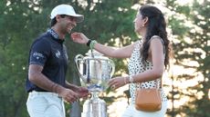 Aaron Rai celebrates with his wife Gaurika Bishnoi after winning the 2026 PGA Championship at Aronimink 